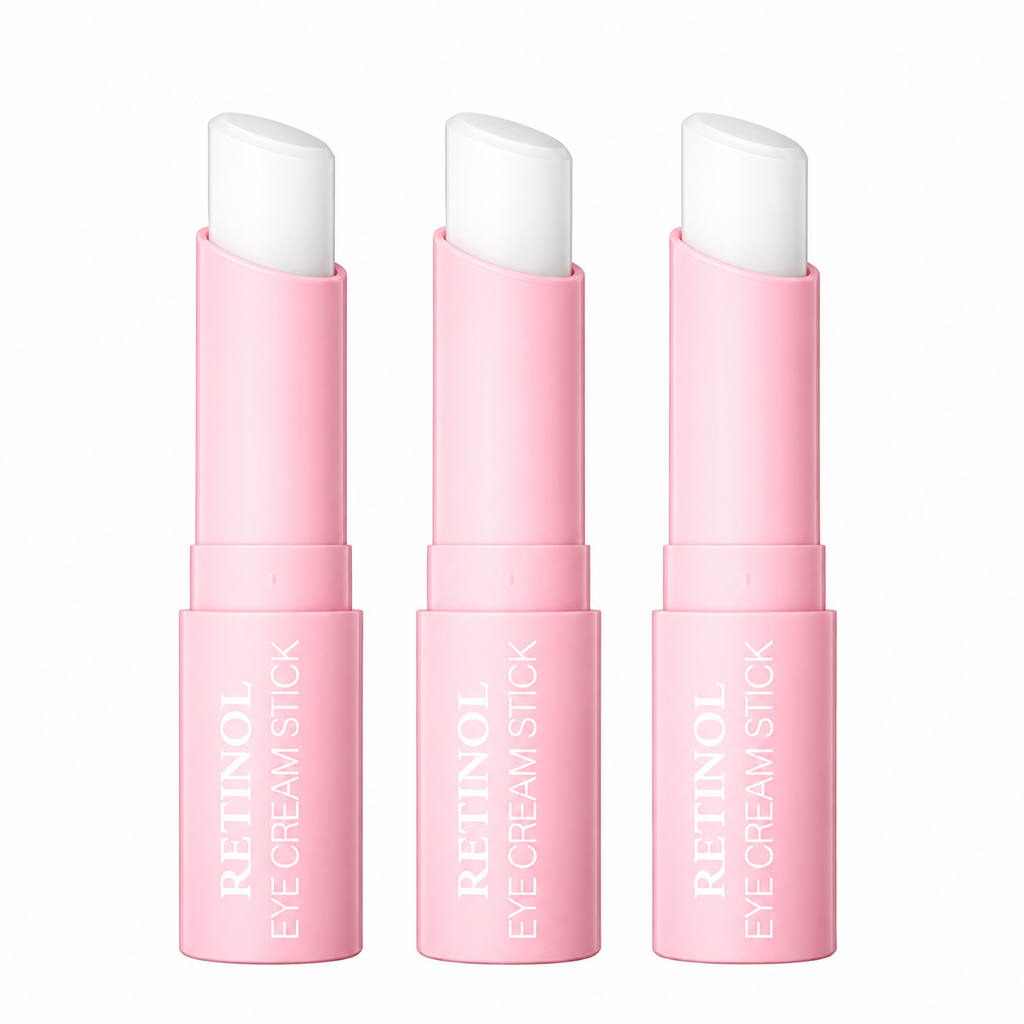 Pink retinol eye cream sticks on white background