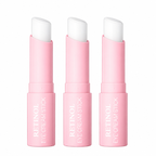 Pink retinol eye cream sticks on white background